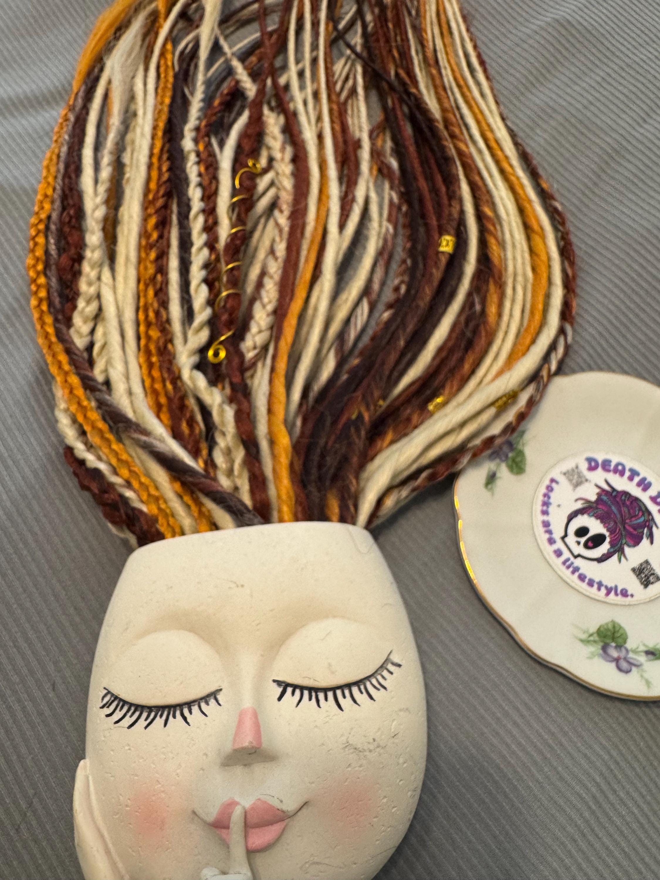 Blonde with cowboy copper accents double ended dreads