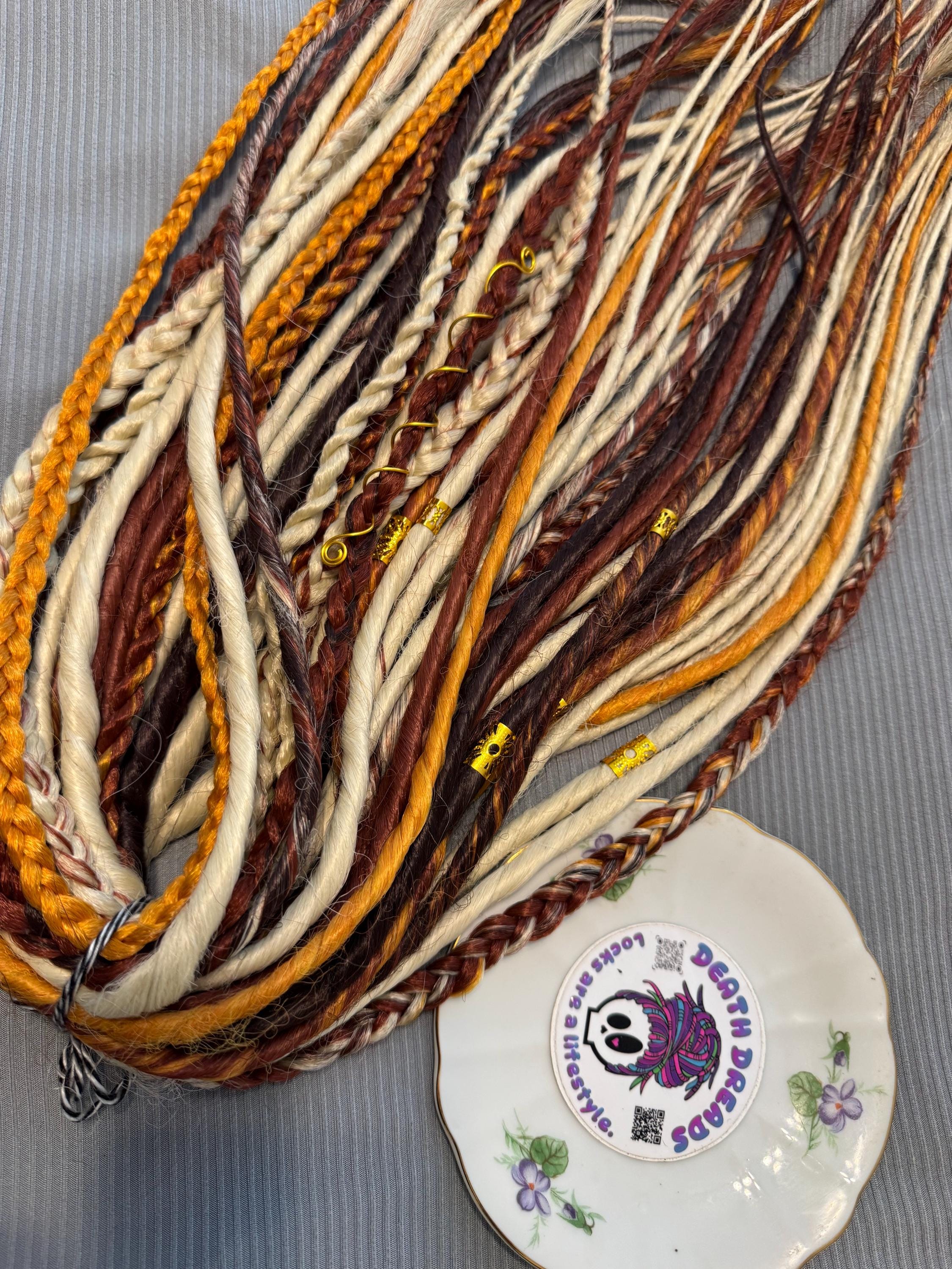 Blonde with cowboy copper accents double ended dreads